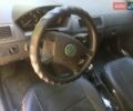 Черный Шкода Фабия, объемом двигателя 1.2 л и пробегом 201 тыс. км за 4500 $, фото 5 на Automoto.ua