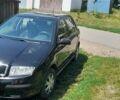 Черный Шкода Фабия, объемом двигателя 1.39 л и пробегом 202 тыс. км за 4300 $, фото 1 на Automoto.ua