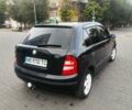 Черный Шкода Фабия, объемом двигателя 1.39 л и пробегом 280 тыс. км за 4600 $, фото 1 на Automoto.ua