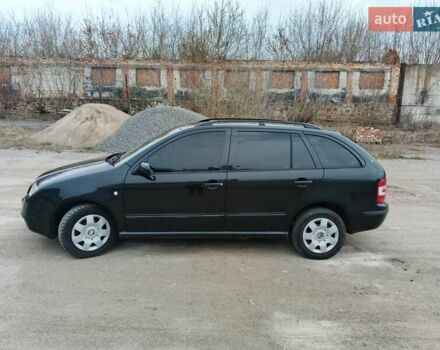 Черный Шкода Фабия, объемом двигателя 1.39 л и пробегом 229 тыс. км за 4350 $, фото 1 на Automoto.ua