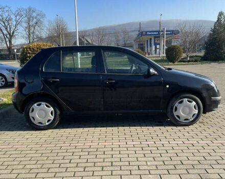 Черный Шкода Фабия, объемом двигателя 1.2 л и пробегом 300 тыс. км за 3500 $, фото 6 на Automoto.ua
