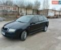 Черный Шкода Фабия, объемом двигателя 1.39 л и пробегом 242 тыс. км за 3550 $, фото 1 на Automoto.ua