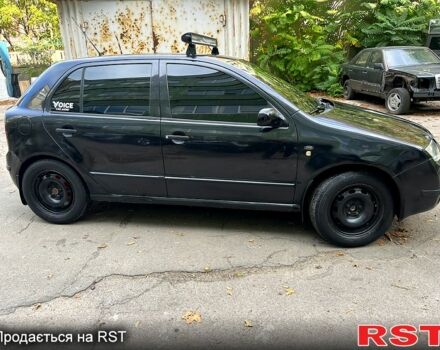 Черный Шкода Фабия, объемом двигателя 1.9 л и пробегом 290 тыс. км за 3300 $, фото 2 на Automoto.ua