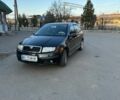 Черный Шкода Фабия, объемом двигателя 1.4 л и пробегом 245 тыс. км за 4500 $, фото 2 на Automoto.ua