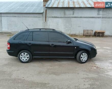 Черный Шкода Фабия, объемом двигателя 1.39 л и пробегом 229 тыс. км за 4350 $, фото 4 на Automoto.ua