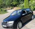 Черный Шкода Фабия, объемом двигателя 1.2 л и пробегом 179 тыс. км за 2450 $, фото 1 на Automoto.ua