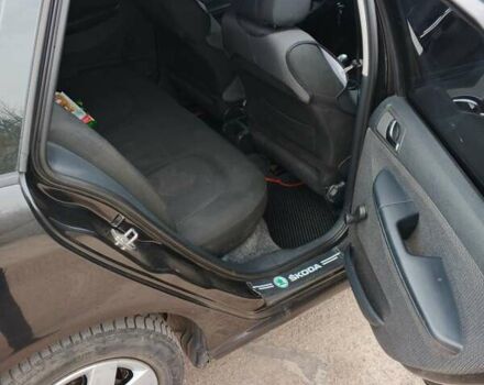 Черный Шкода Фабия, объемом двигателя 1.39 л и пробегом 229 тыс. км за 4350 $, фото 11 на Automoto.ua