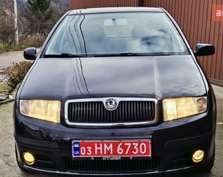 Черный Шкода Фабия, объемом двигателя 1.39 л и пробегом 173 тыс. км за 5799 $, фото 5 на Automoto.ua