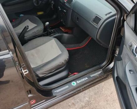 Черный Шкода Фабия, объемом двигателя 1.39 л и пробегом 229 тыс. км за 4350 $, фото 13 на Automoto.ua