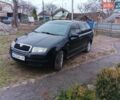 Черный Шкода Фабия, объемом двигателя 1.39 л и пробегом 229 тыс. км за 4350 $, фото 2 на Automoto.ua