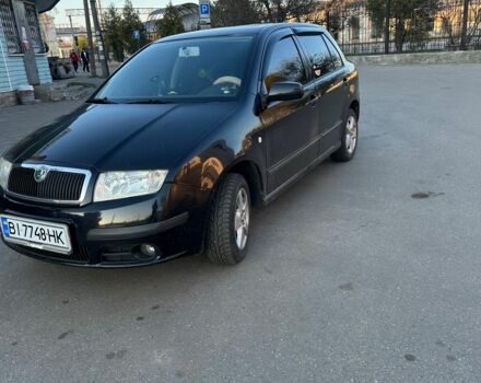 Черный Шкода Фабия, объемом двигателя 1.4 л и пробегом 245 тыс. км за 4500 $, фото 1 на Automoto.ua