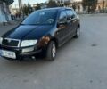 Черный Шкода Фабия, объемом двигателя 1.4 л и пробегом 245 тыс. км за 4500 $, фото 1 на Automoto.ua