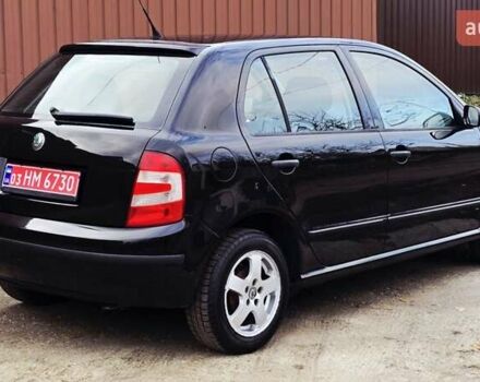 Черный Шкода Фабия, объемом двигателя 1.39 л и пробегом 173 тыс. км за 5799 $, фото 18 на Automoto.ua