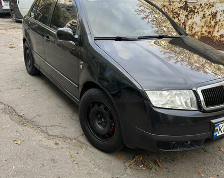 Черный Шкода Фабия, объемом двигателя 1.9 л и пробегом 290 тыс. км за 3300 $, фото 2 на Automoto.ua