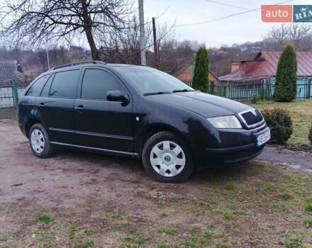 Черный Шкода Фабия, объемом двигателя 1.39 л и пробегом 229 тыс. км за 4350 $, фото 8 на Automoto.ua
