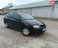 Черный Шкода Фабия, объемом двигателя 1.39 л и пробегом 229 тыс. км за 4350 $, фото 3 на Automoto.ua