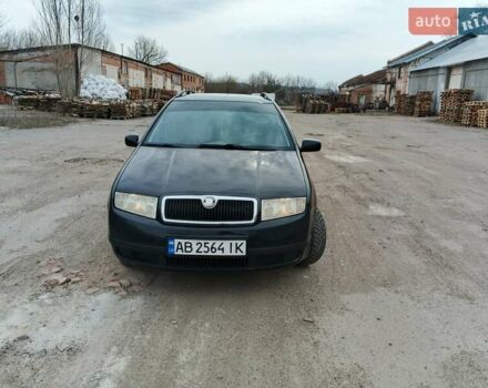 Черный Шкода Фабия, объемом двигателя 1.39 л и пробегом 229 тыс. км за 4350 $, фото 2 на Automoto.ua