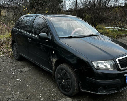 Черный Шкода Фабия, объемом двигателя 1.2 л и пробегом 204 тыс. км за 2750 $, фото 1 на Automoto.ua