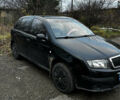Черный Шкода Фабия, объемом двигателя 1.2 л и пробегом 204 тыс. км за 2750 $, фото 1 на Automoto.ua