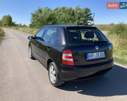 Черный Шкода Фабия, объемом двигателя 1.4 л и пробегом 250 тыс. км за 5150 $, фото 5 на Automoto.ua