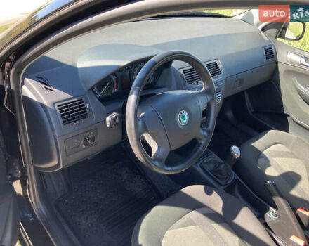 Черный Шкода Фабия, объемом двигателя 1.4 л и пробегом 250 тыс. км за 5150 $, фото 28 на Automoto.ua