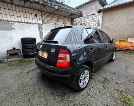 Черный Шкода Фабия, объемом двигателя 1.2 л и пробегом 315 тыс. км за 3300 $, фото 1 на Automoto.ua