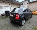 Черный Шкода Фабия, объемом двигателя 1.2 л и пробегом 315 тыс. км за 3300 $, фото 1 на Automoto.ua