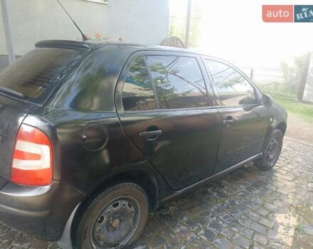 Черный Шкода Фабия, объемом двигателя 1.2 л и пробегом 164 тыс. км за 3000 $, фото 4 на Automoto.ua