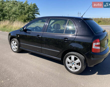 Черный Шкода Фабия, объемом двигателя 1.4 л и пробегом 250 тыс. км за 5150 $, фото 3 на Automoto.ua