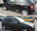 Черный Шкода Фабия, объемом двигателя 1.2 л и пробегом 172 тыс. км за 3800 $, фото 1 на Automoto.ua