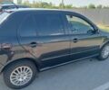 Черный Шкода Фабия, объемом двигателя 1.4 л и пробегом 247 тыс. км за 3558 $, фото 2 на Automoto.ua