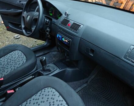 Черный Шкода Фабия, объемом двигателя 1.2 л и пробегом 315 тыс. км за 3300 $, фото 14 на Automoto.ua