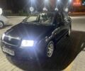 Черный Шкода Фабия, объемом двигателя 1.2 л и пробегом 246 тыс. км за 2799 $, фото 1 на Automoto.ua