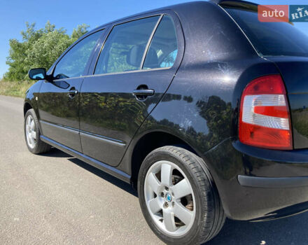 Черный Шкода Фабия, объемом двигателя 1.4 л и пробегом 250 тыс. км за 5150 $, фото 14 на Automoto.ua