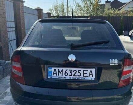 Черный Шкода Фабия, объемом двигателя 1.2 л и пробегом 154 тыс. км за 3500 $, фото 2 на Automoto.ua