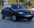 Черный Шкода Фабия, объемом двигателя 1.2 л и пробегом 220 тыс. км за 2999 $, фото 1 на Automoto.ua