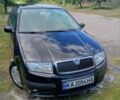 Черный Шкода Фабия, объемом двигателя 1.39 л и пробегом 216 тыс. км за 3500 $, фото 1 на Automoto.ua