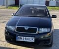 Черный Шкода Фабия, объемом двигателя 1.2 л и пробегом 200 тыс. км за 2899 $, фото 1 на Automoto.ua