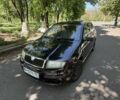 Черный Шкода Фабия, объемом двигателя 1.2 л и пробегом 250 тыс. км за 2999 $, фото 2 на Automoto.ua