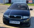 Черный Шкода Фабия, объемом двигателя 1.2 л и пробегом 201 тыс. км за 3000 $, фото 1 на Automoto.ua