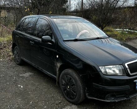Черный Шкода Фабия, объемом двигателя 1.2 л и пробегом 204 тыс. км за 2750 $, фото 1 на Automoto.ua