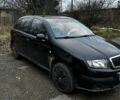 Черный Шкода Фабия, объемом двигателя 1.2 л и пробегом 204 тыс. км за 2750 $, фото 1 на Automoto.ua