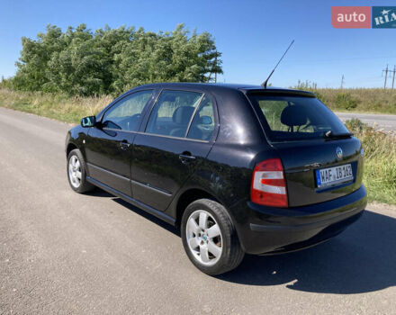 Черный Шкода Фабия, объемом двигателя 1.4 л и пробегом 250 тыс. км за 5150 $, фото 4 на Automoto.ua