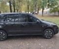 Черный Шкода Фабия, объемом двигателя 1.2 л и пробегом 234 тыс. км за 4200 $, фото 2 на Automoto.ua