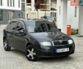 Черный Шкода Фабия, объемом двигателя 1.2 л и пробегом 210 тыс. км за 3750 $, фото 1 на Automoto.ua