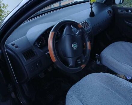 Черный Шкода Фабия, объемом двигателя 1.2 л и пробегом 313 тыс. км за 2700 $, фото 1 на Automoto.ua