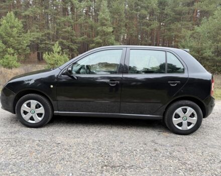 Черный Шкода Фабия, объемом двигателя 1.2 л и пробегом 175 тыс. км за 3950 $, фото 2 на Automoto.ua