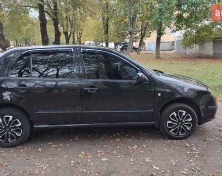 Черный Шкода Фабия, объемом двигателя 1.2 л и пробегом 234 тыс. км за 4200 $, фото 5 на Automoto.ua