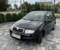 Черный Шкода Фабия, объемом двигателя 1.39 л и пробегом 150 тыс. км за 4800 $, фото 1 на Automoto.ua
