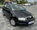 Черный Шкода Фабия, объемом двигателя 1.39 л и пробегом 150 тыс. км за 4800 $, фото 7 на Automoto.ua